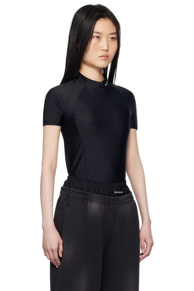 Stretch nylon jersey rash guard. Logo bonded at mock neck.

Supplier color: Black