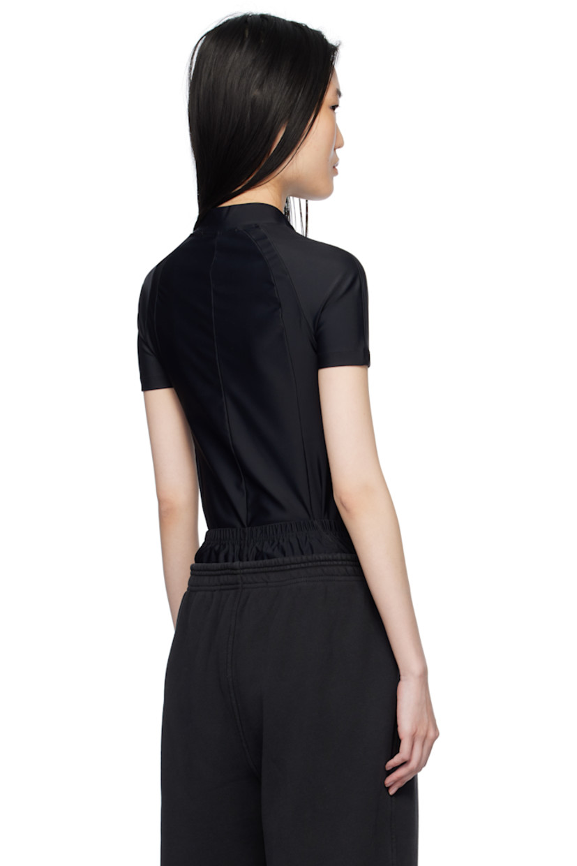 Stretch nylon jersey rash guard. Logo bonded at mock neck.

Supplier color: Black