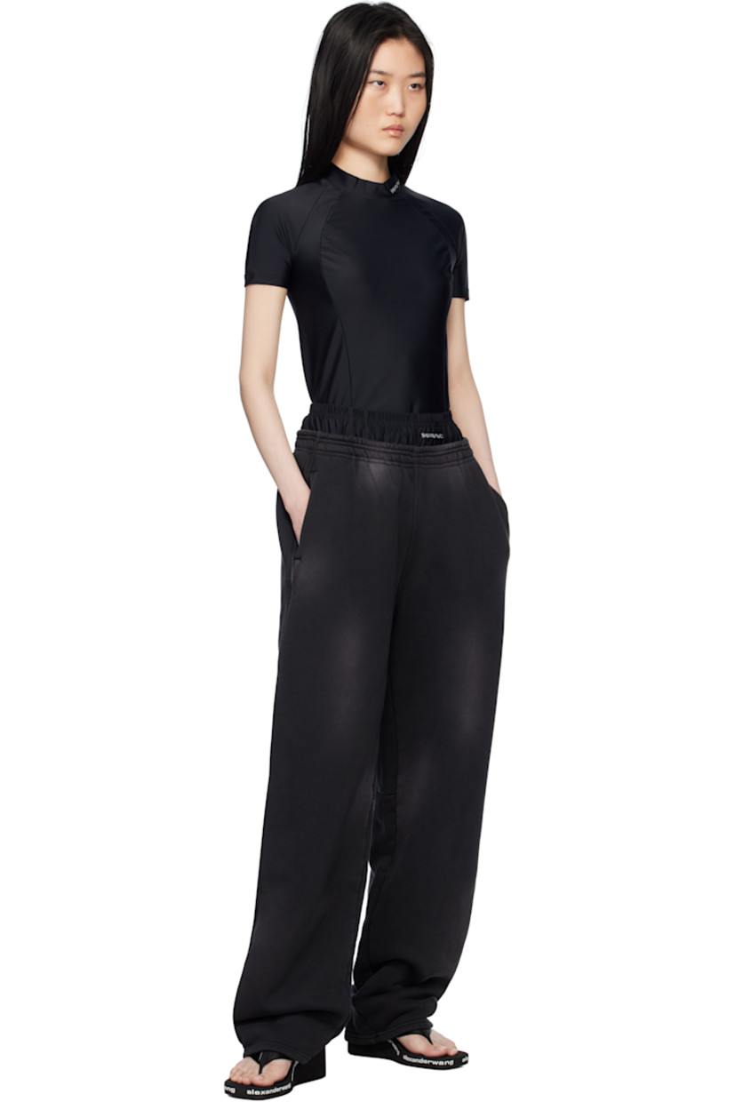 Stretch nylon jersey rash guard. Logo bonded at mock neck.

Supplier color: Black