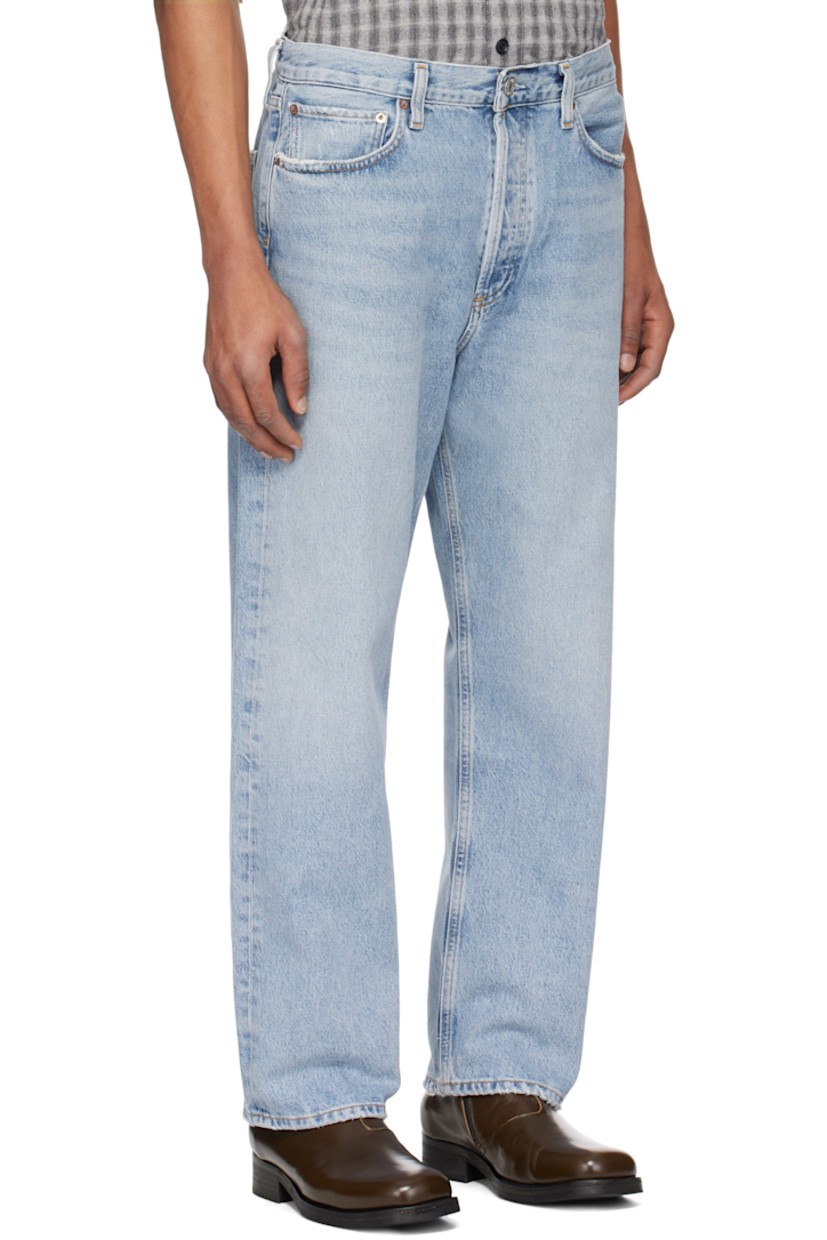 Non-stretch regenerative cotton denim jeans. Fading, whiskering, and distressing throughout.

· Straight-leg 
· Mid-rise
· Belt loops
· Five-pocket styling
· Button-fly
· Logo-engraved silver- and gold-tone hardware
· Contrast stitching in tan

Supplier color: Force