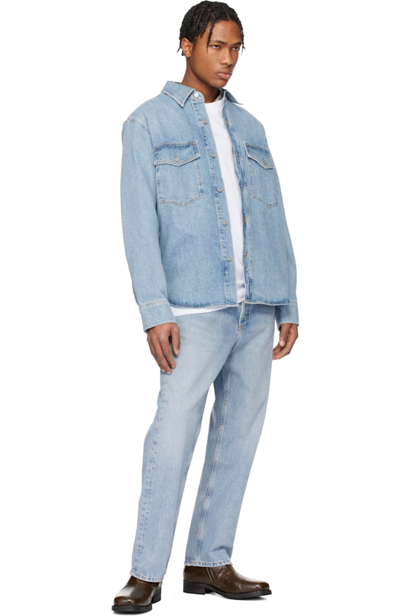 Non-stretch regenerative cotton denim jeans. Fading, whiskering, and distressing throughout.

· Straight-leg 
· Mid-rise
· Belt loops
· Five-pocket styling
· Button-fly
· Logo-engraved silver- and gold-tone hardware
· Contrast stitching in tan

Supplier color: Force