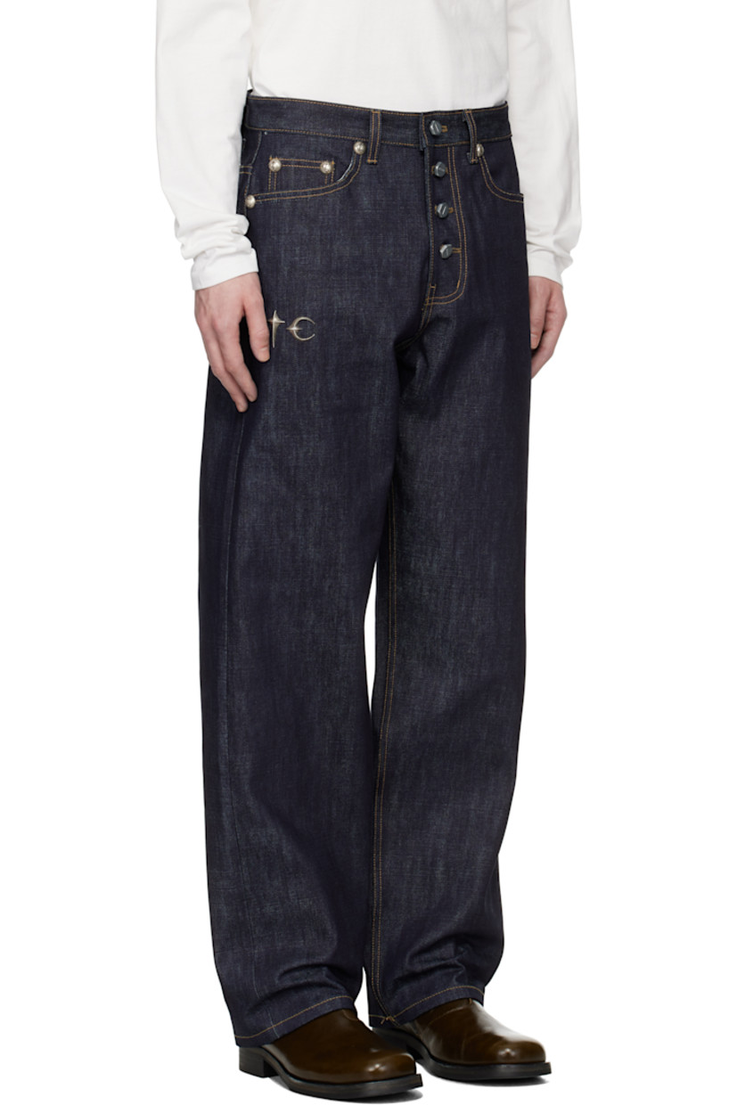 Indigo-dyed non-stretch left-hand twill selvedge denim jeans.

· Belt loops
· Five-pocket styling
· Button fly
· Logo hardware at leg
· Leather logo patch at back waistband
· Logo graphic embroidered at back pockets
· Logo-engraved antiqued silver-tone hardware
· Contrast stitching in tan

Supplier color: Indigo