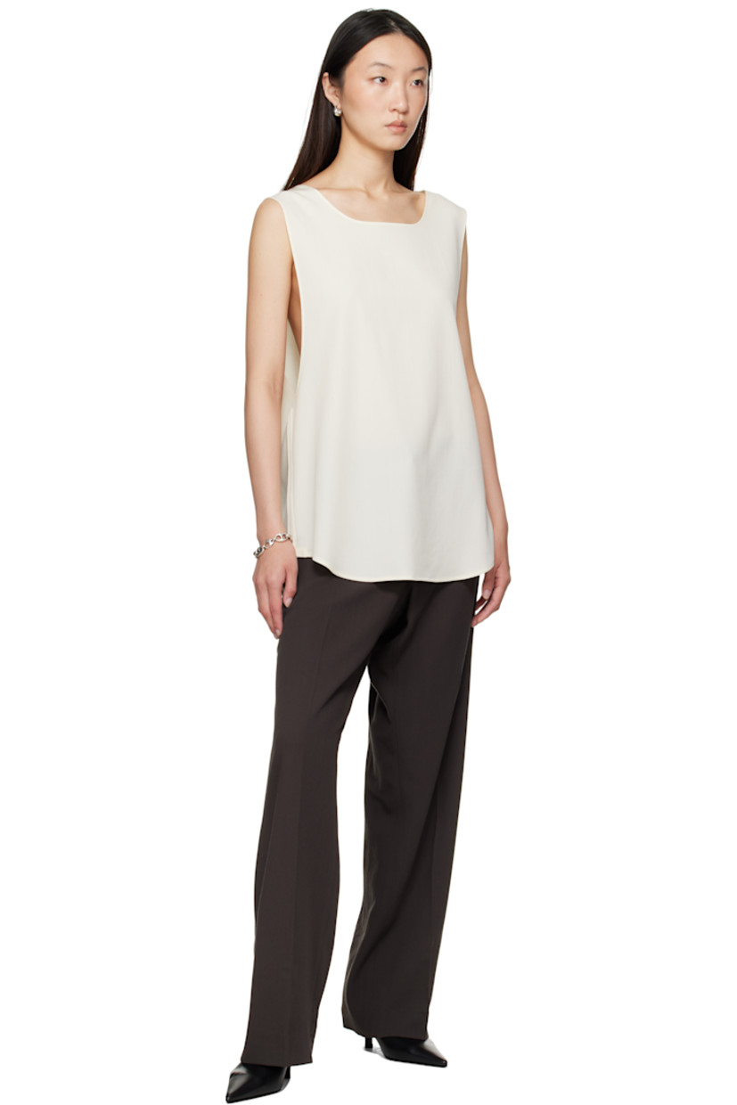 Cotton twill trousers.

· Straight-leg 
· Belt loops
· Four-pocket styling
· Zip fly 
· Creased legs 

Supplier color: Dark chocolate brown