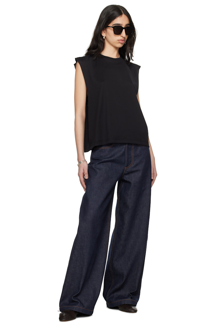 Loose-fit cotton jersey T-shirt. 

· Rib-knit crewneck 
· Cropped hem
· Rolled edge at dropped armscyes 
· Logo printed at back collar

Supplier color: Black