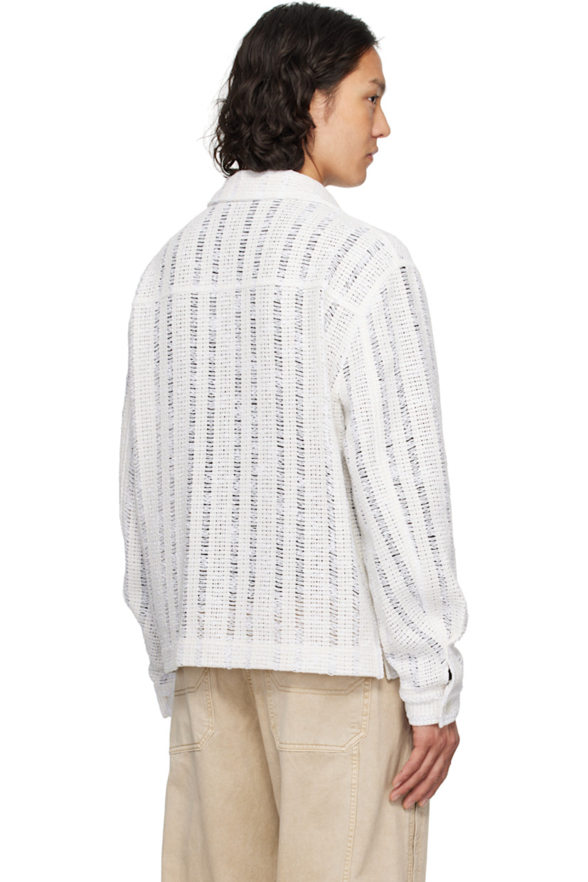 Crocheted cotton-blend jacket. Laddering throughout. 

· Spread collar
· Button closure
· Welt pockets
· Vented side seams
· Single-button barrel cuffs

Supplier color: White