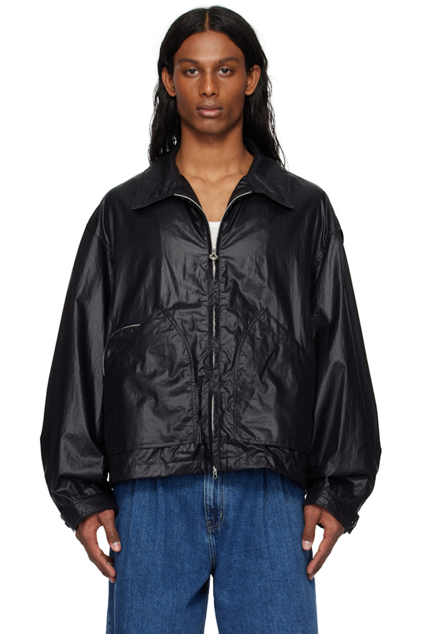 Crinkled nylon taffeta jacket.

· Spread collar
· Two-way zip closure
· Patch and zip pockets
· Bungee-style drawstring at hem
· Zip vent at side seams
· Adjustable press-stud tab at cuffs
· Press-stud expansion panels at back

Supplier color: Black