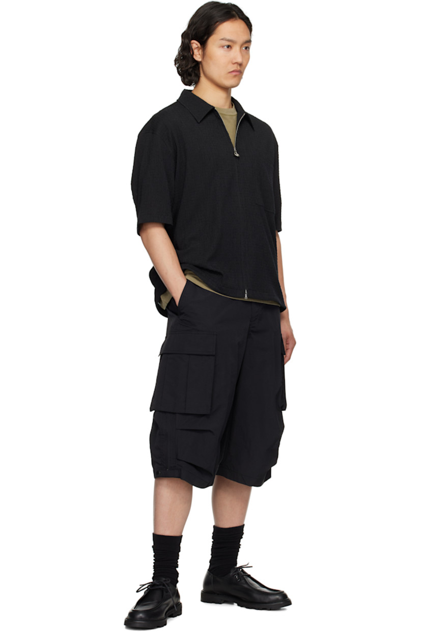 Nylon twill cargo shorts. 

· Belt loops
· Four-pocket styling
· Zip fly
· Pleats at knees
· Cargo pocket at outseams
· Zip expansion panel with press-stud tab at outseams

Supplier color: Black