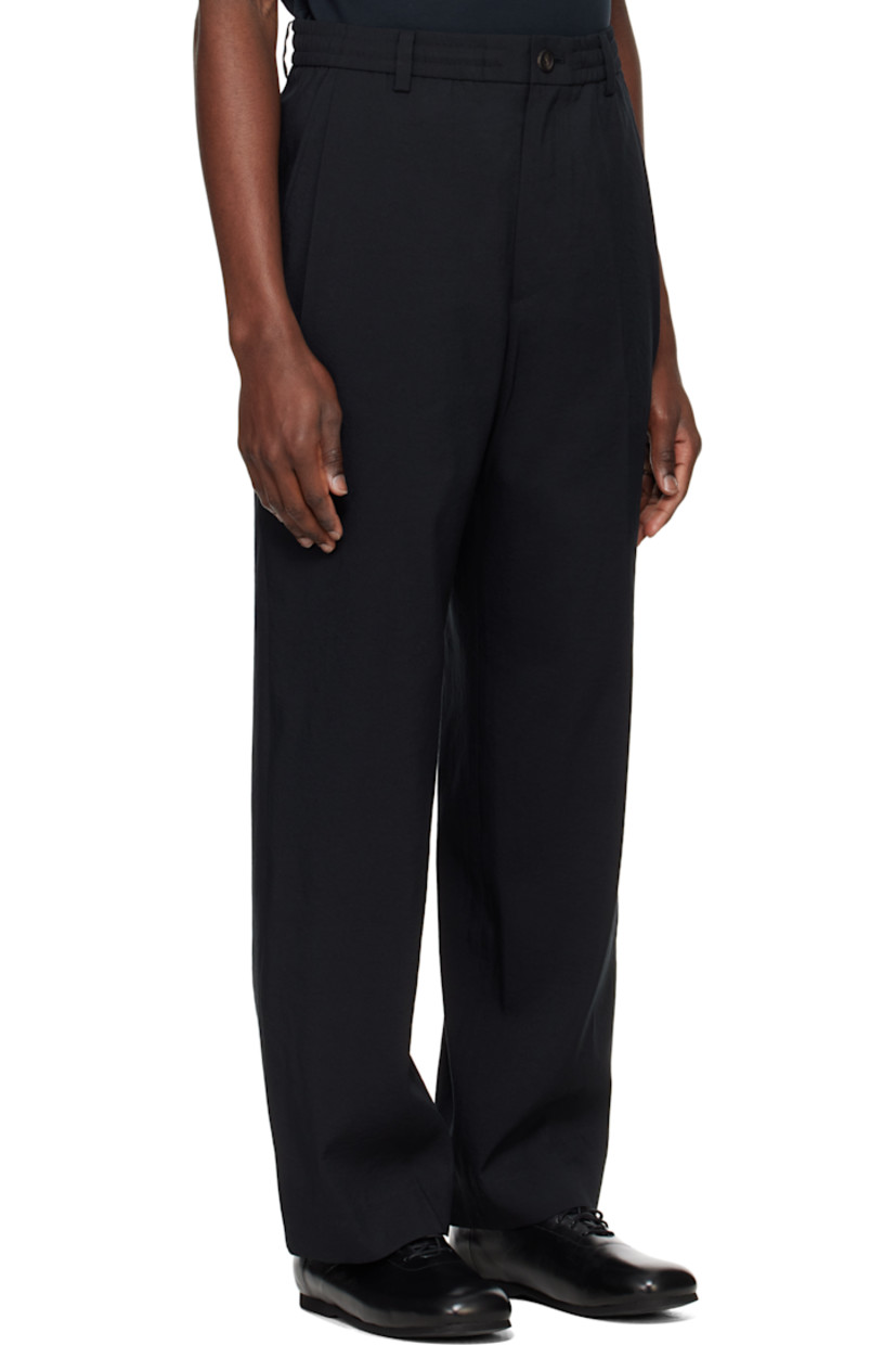 Wide-leg knit polyester- and cotton-blend terry trousers. 

· Belt loops
· Concealed drawstring at elasticized waistband 
· Four-pocket styling 
· Zip fly 
· Darts at back 

Supplier color: Black