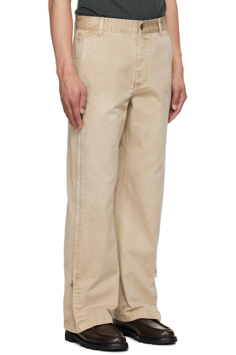 Wide-leg cotton twill trousers. 

· Belt loops
· Four-pocket styling
· Zip fly
· Zip expansion panel at outseams
· Leather logo patch at back waistband

Supplier color: Beige