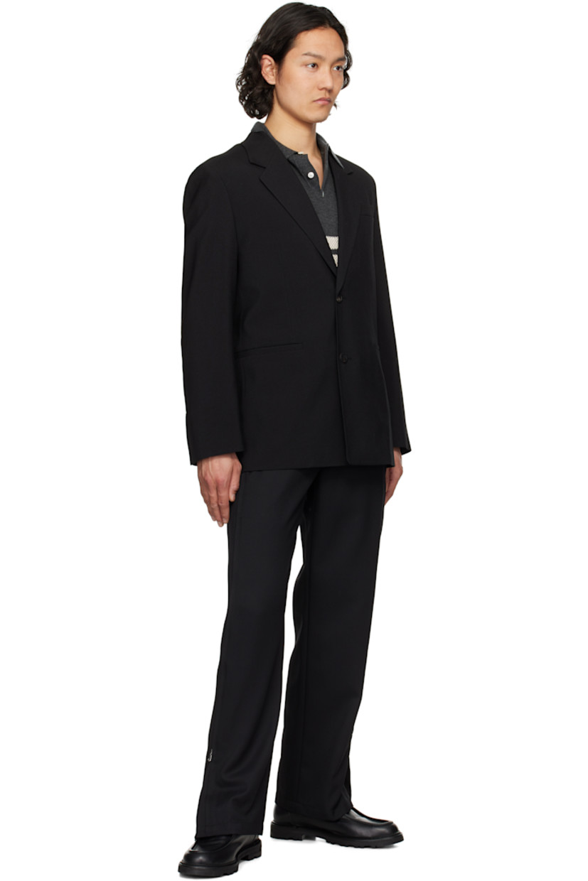 Wide-leg polyester- and wool-blend twill trousers. 

· Belt loops
· Four-pocket styling
· Zip fly
· Zip expansion panel at outseams

Supplier color: Black