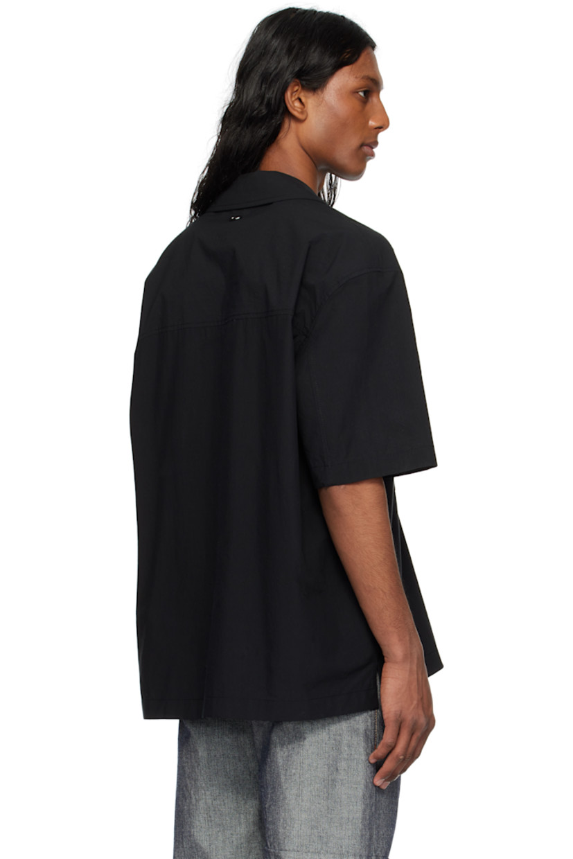 Stretch nylon poplin shirt. 

· Open spread collar
· Button closure
· Patch pockets
· Vented side seams
· Logo hardware at back collar

Supplier color: Black