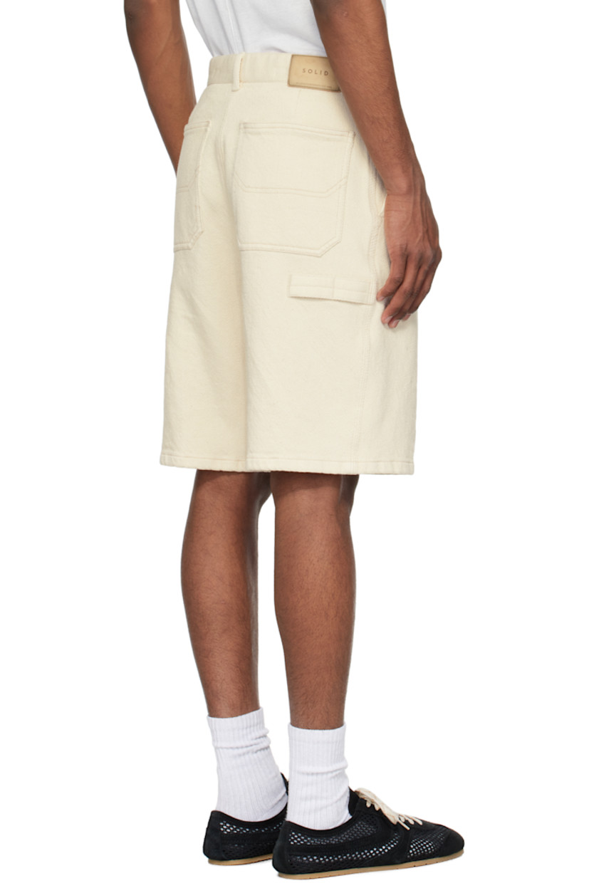 Cotton twill shorts.

· Belt loops
· Five-pocket styling
· Zip fly
· Leather logo patch at back waistband
· Patch pocket at back leg
· Loops at back leg
· Logo-engraved silver-tone hardware

Supplier color: Off-white