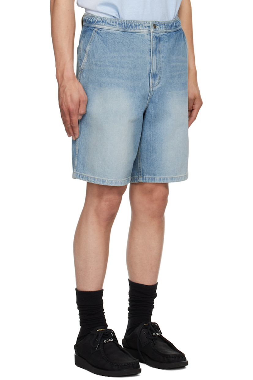 Non-stretch denim shorts. Fading and whiskering throughout.

· Elasticized waistband 
· Four-pocket styling
· Zip fly
· Leather logo patch at back waistband

Supplier color: Blue