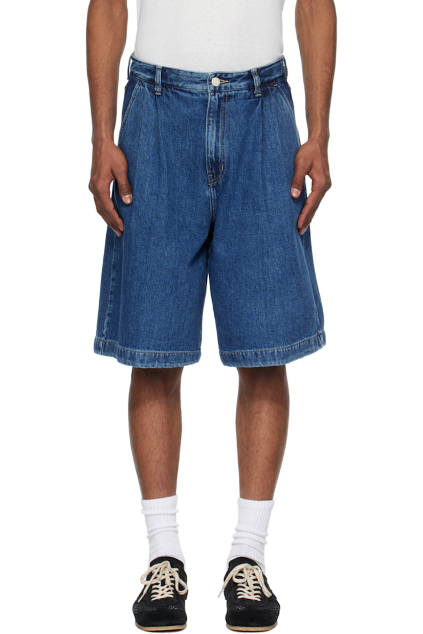 Non-stretch denim shorts. Fading throughout.

· Belt loops
· Pleats at waistband
· Four-pocket styling
· Zip fly
· Leather logo patch at back waistband
· Contrast stitching in tan

Supplier color: Blue