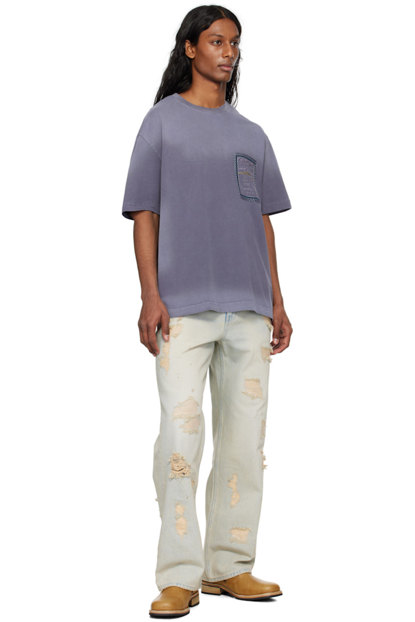 Cotton jersey T-shirt. Fading throughout.

· Rib-knit crewneck
· Logo and text embroidered at chest and back collar
· Dropped shoulders

Supplier color: Violet