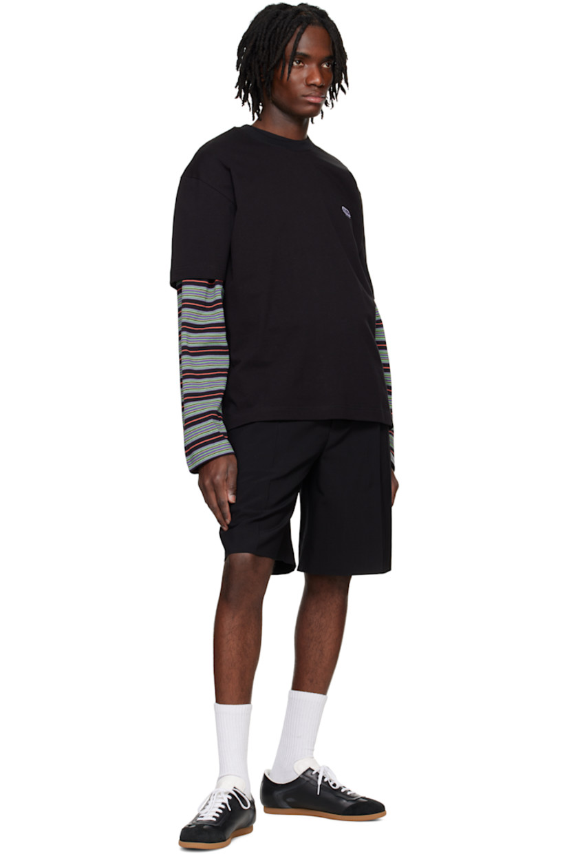 Cotton jersey T-shirt. 

· Rib-knit crewneck 
· Logo embroidered at chest 
· Vented side seams 

Supplier color: Black
