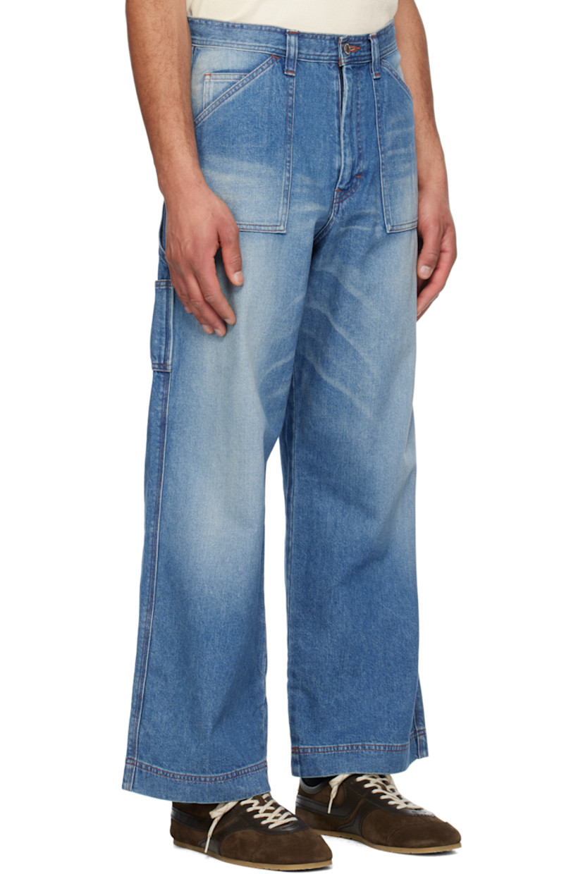 Loose-fit 13 oz non-stretch denim jeans. Hand-fading and whiskering throughout.

· Belt loops
· Five-pocket styling
· Zip fly
· Hammer loop at outseam
· Patch pockets at outseam
· Logo flag at back pocket
· Contrast stitching in orange

Supplier color: Blue