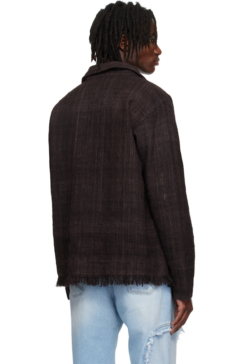 Hand-loomed wool hopsack jacket. 

· Spread collar
· Button closure
· Welt pockets
· Fringed detailing at hem
· Full plain-woven lining 
 
Supplier color: Brown