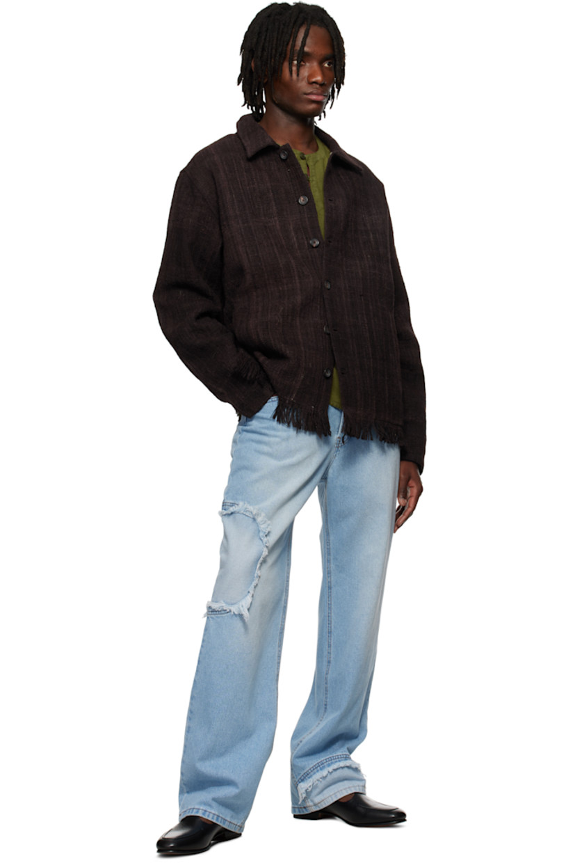 Hand-loomed wool hopsack jacket. 

· Spread collar
· Button closure
· Welt pockets
· Fringed detailing at hem
· Full plain-woven lining 
 
Supplier color: Brown