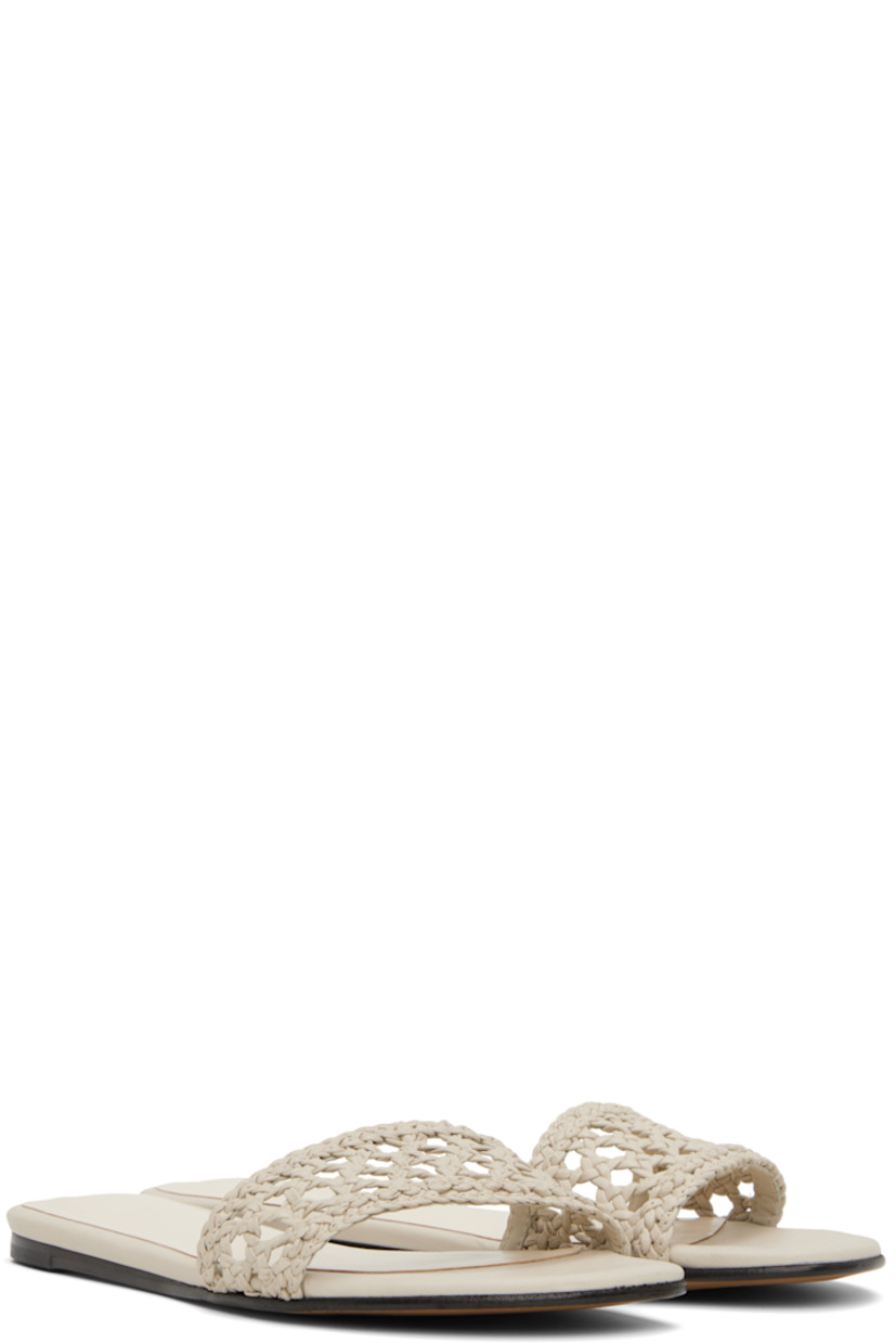 Handcrafted woven leather pool slides in beige.

· Open toe
· Logo embossed at padded calfskin footbed
· Leather sole with rubber injection

Supplier color: Ecru