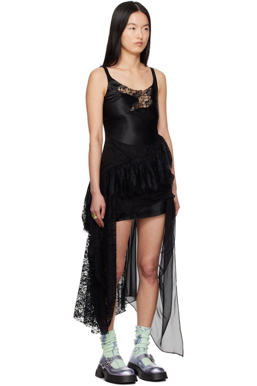 Acetate satin and silk chiffon minidress. Lace trim, gathering, and ruffles throughout. 

· Paneled construction
· Lace panel at scoop neck
· Darts at chest
· Asymmetric hem 
· Concealed zip closure at side
· Low back 

Supplier color: Black