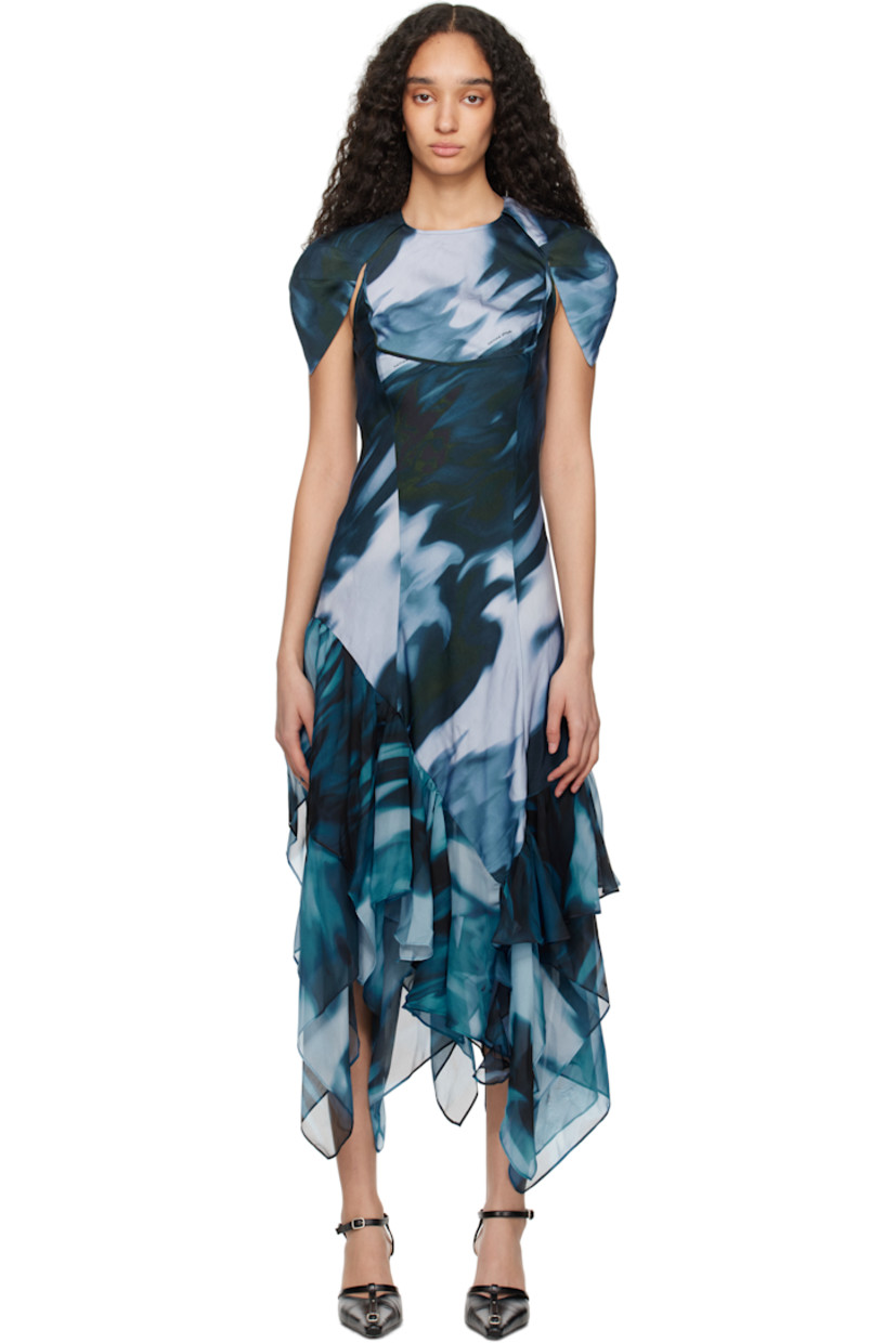 Bias-cut rose sylk satin and silk chiffon maxi dress. Graphic and logo pattern printed throughout. 

· Round neck
· Structured cap sleeves
· Piping at chest
· Ruffles at handkerchief hem 
· Hook-eye fastening at back collar

Supplier color: Navy melting bloom