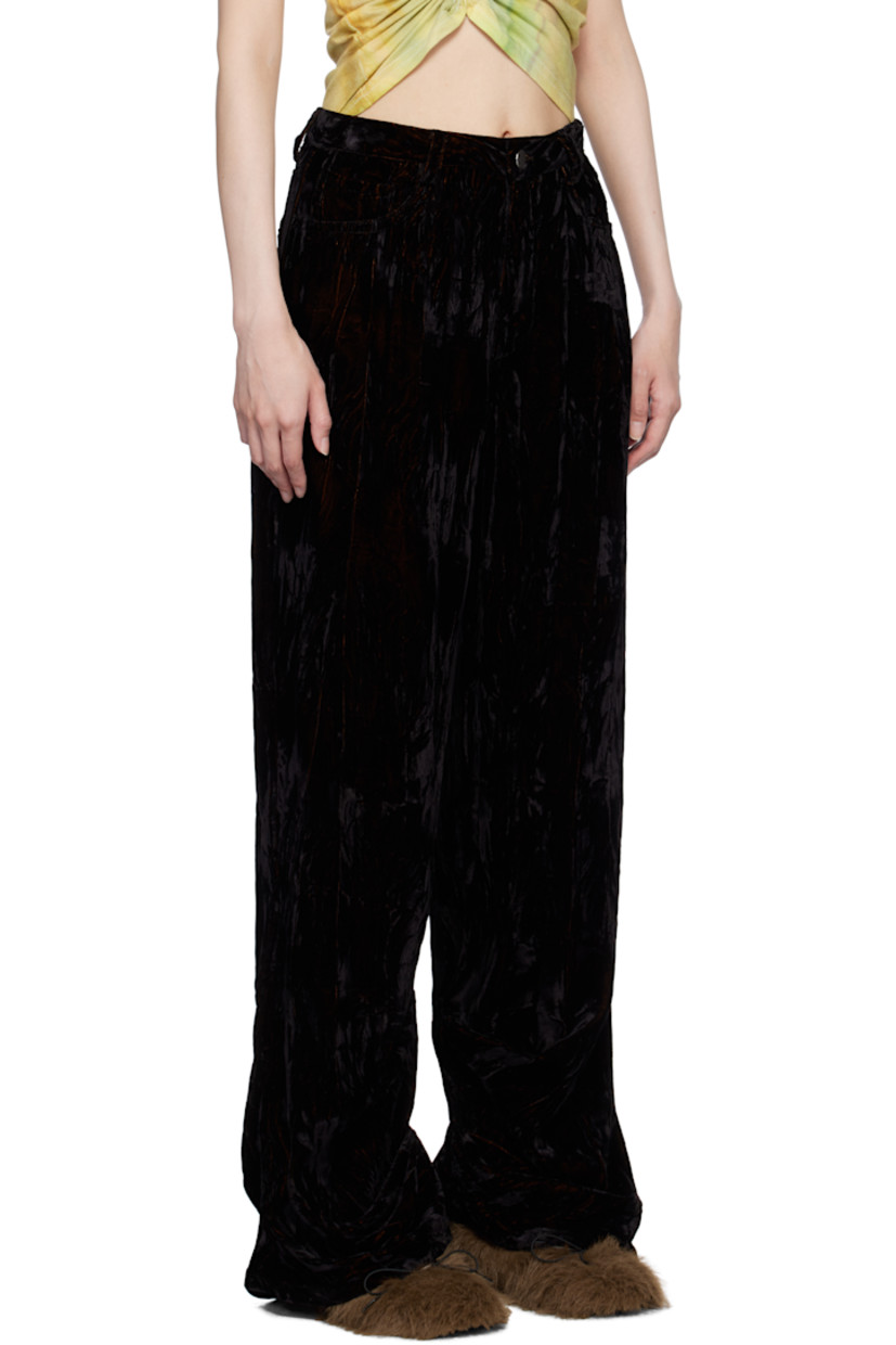 Relaxed-fit acetate- and cupro-blend crushed velvet trousers.

· Mid-rise
· Belt loops
· Five-pocket styling
· Zip-fly
· Gathering at inseams

Supplier color: Black