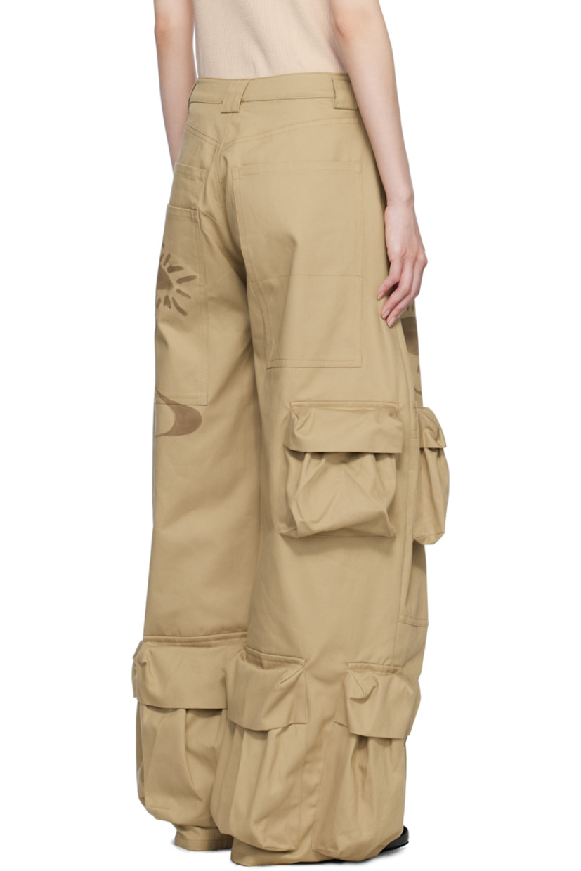 Relaxed-fit and hand-dyed cotton twill cargo pants. Hand-painted floral graphics throughout.

· Wide-leg 
· Mid-rise
· Belt loops
· Five-pocket styling
· Zip-fly
· Bellows pockets at legs
· D-ring at front

Supplier color: Sand daisy