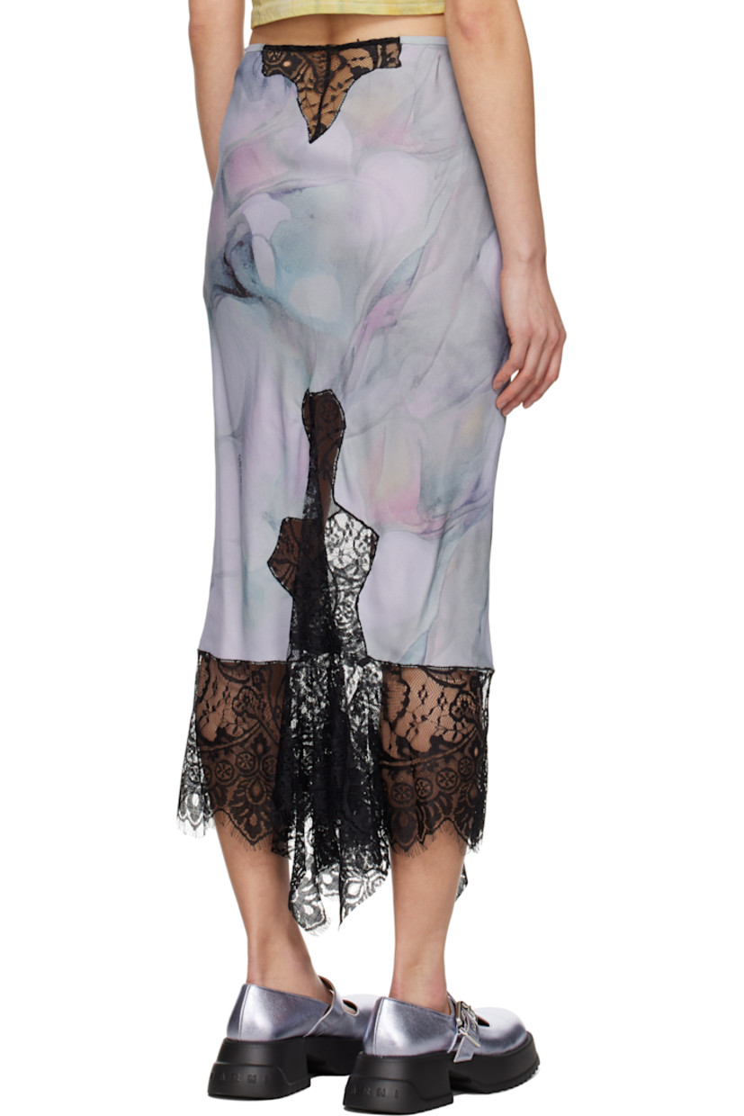Bias-cut viscose crêpe midi skirt. Graphic pattern printed throughout.

· Elasticized waistband
· Lace trim at handkerchief hem 
· Concealed zip closure at side 
· Cutout with lace trim at back waistband
· Logo printed at back
· Unlined 

Supplier color: Oil mold