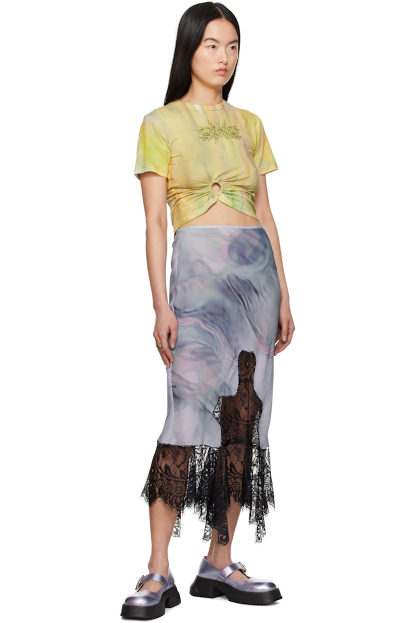 Bias-cut viscose crêpe midi skirt. Graphic pattern printed throughout.

· Elasticized waistband
· Lace trim at handkerchief hem 
· Concealed zip closure at side 
· Cutout with lace trim at back waistband
· Logo printed at back
· Unlined 

Supplier color: Oil mold