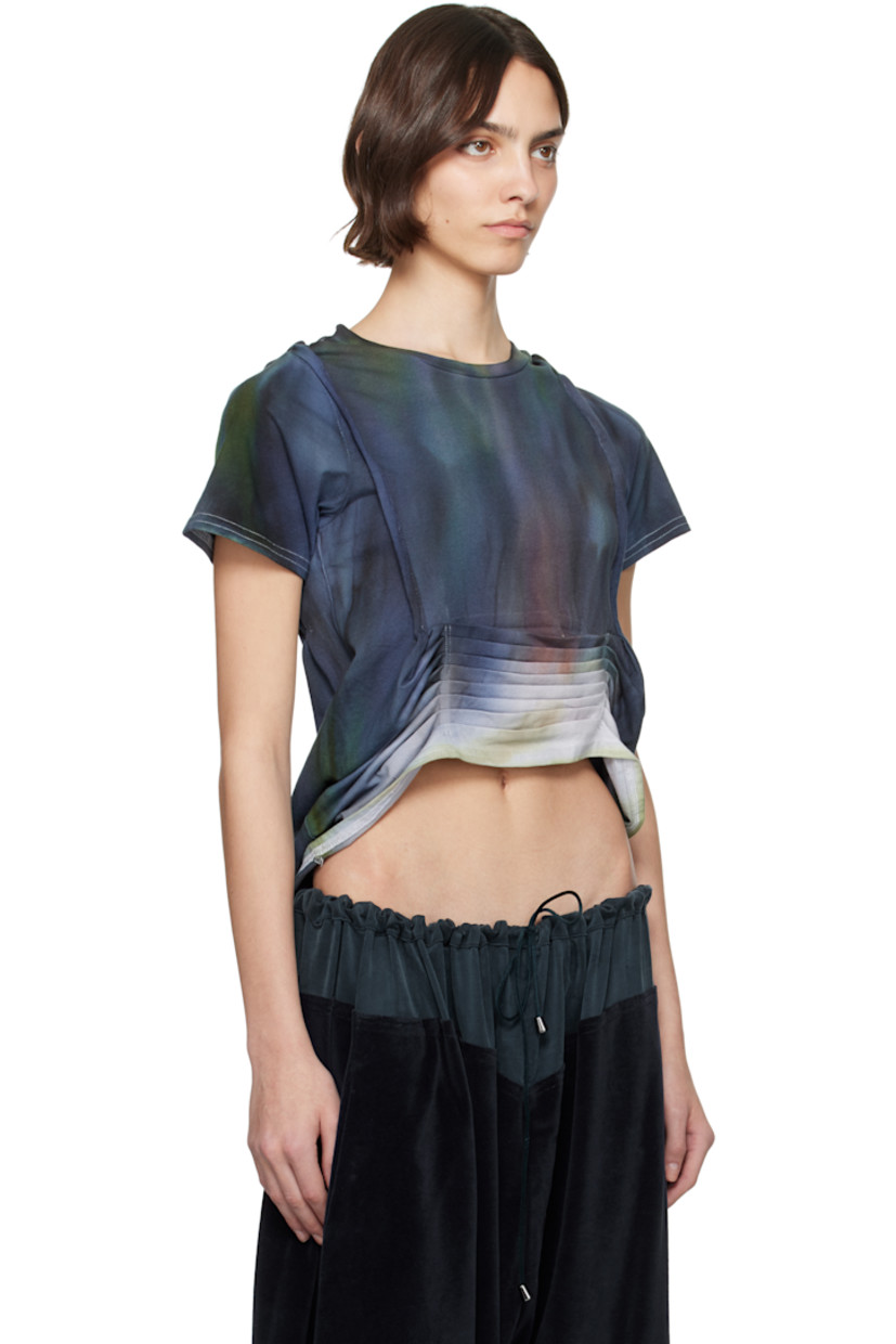 Organic cotton jersey T-shirt. Hand-dyed tie-dye pattern throughout.

· Rib-knit crewneck
· Pleats at front and back
· Pinched seams at front
· Raw edge at open back

Each item is unique. Please note coloration may vary.

Supplier color: Deep ice