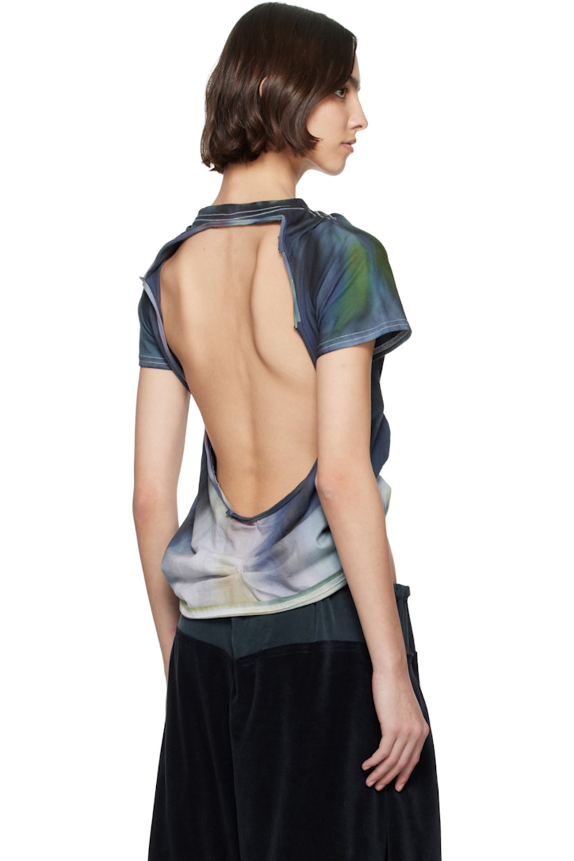 Organic cotton jersey T-shirt. Hand-dyed tie-dye pattern throughout.

· Rib-knit crewneck
· Pleats at front and back
· Pinched seams at front
· Raw edge at open back

Each item is unique. Please note coloration may vary.

Supplier color: Deep ice