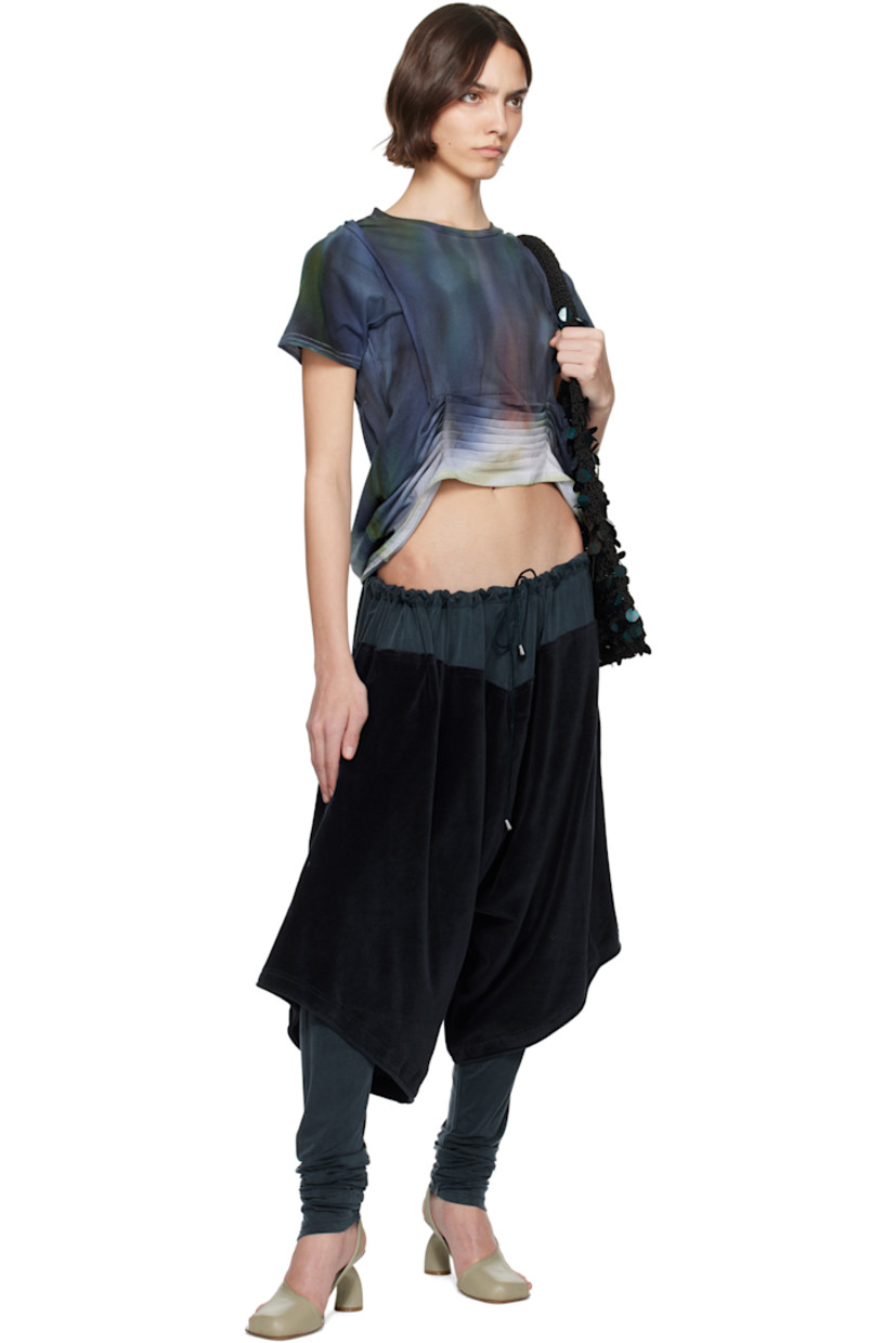 Organic cotton jersey T-shirt. Hand-dyed tie-dye pattern throughout.

· Rib-knit crewneck
· Pleats at front and back
· Pinched seams at front
· Raw edge at open back

Each item is unique. Please note coloration may vary.

Supplier color: Deep ice