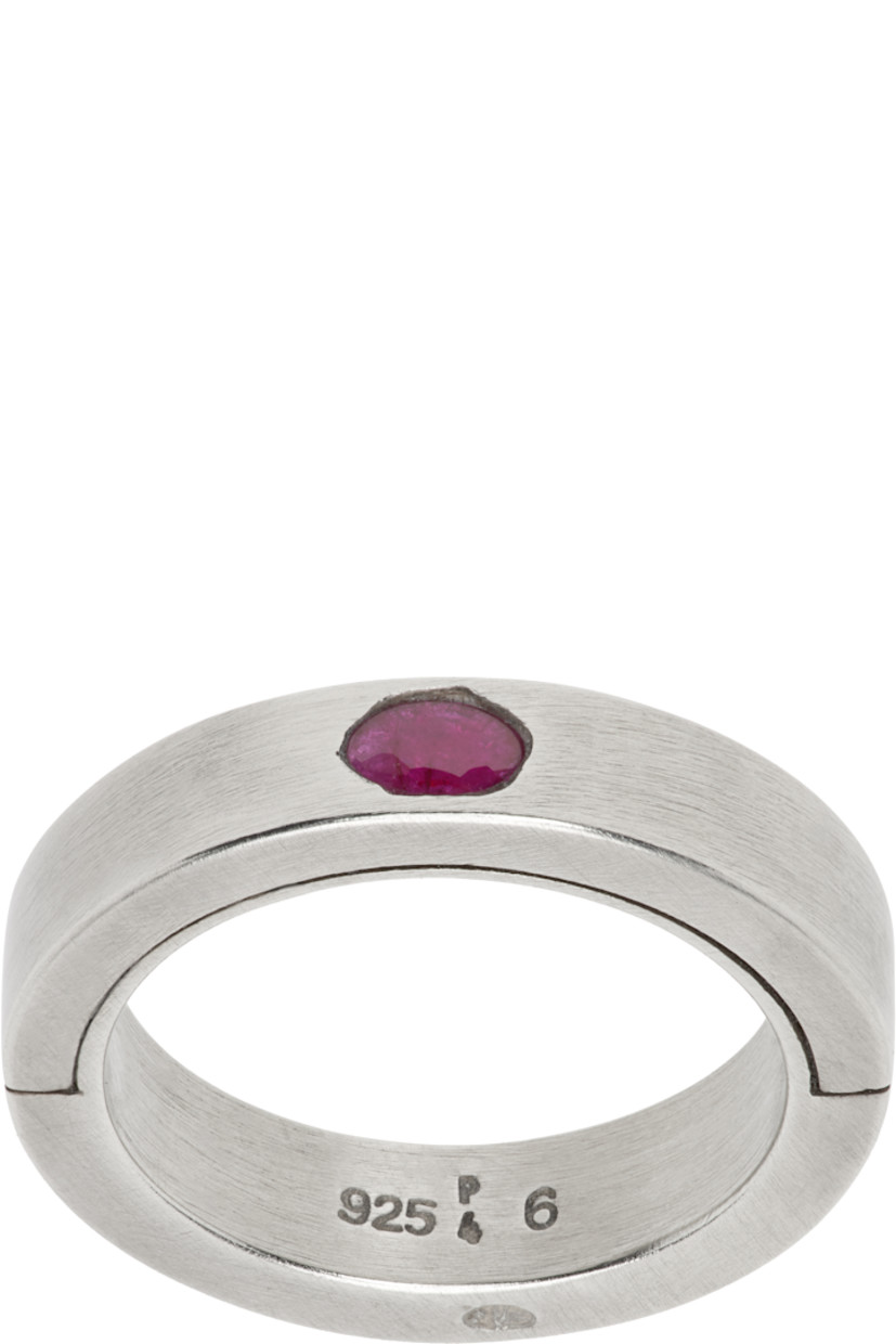 Handcrafted band ring in antiqued sterling silver. 

· Inset 0.1 ct ruby at face
· Hallmarking at inner band

Supplier color: Dirty sterling