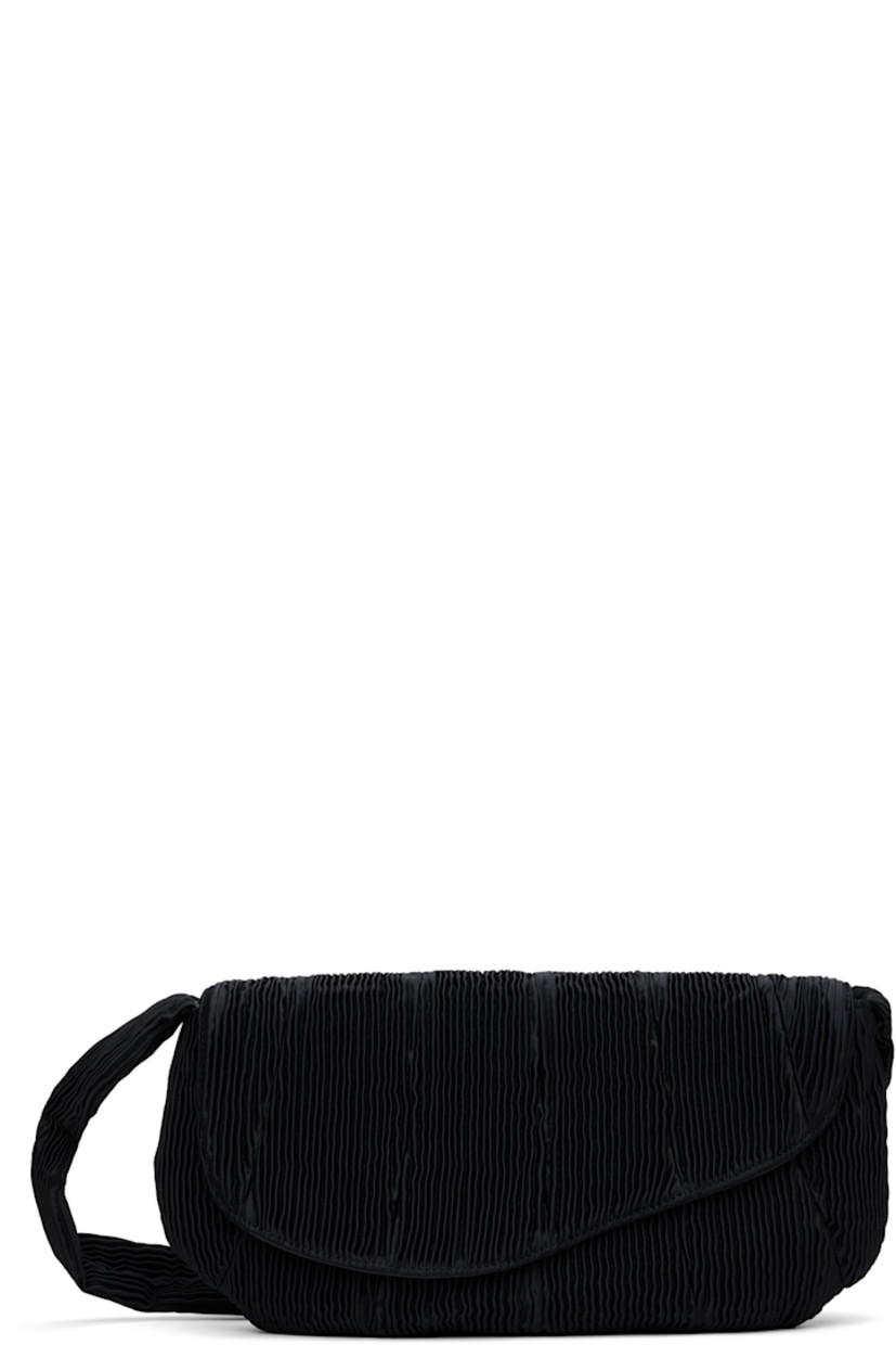 Pleated satin messenger bag in black.

· Integrated shoulder strap
· Foldover magnetic press-stud flap
· Zip closure
· Patch pocket at interior
· Twill lining
· H10" x W16" x D1.5"

Supplier color: Black