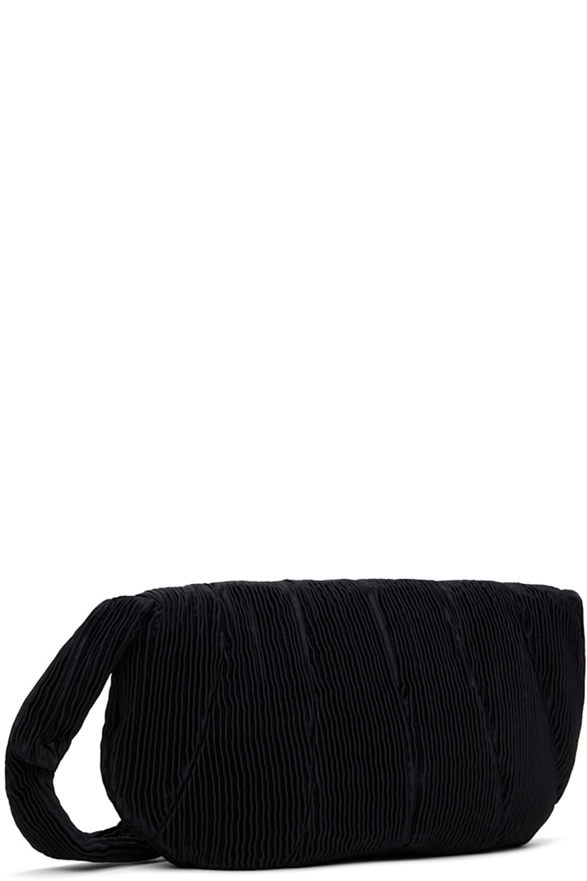 Pleated satin messenger bag in black.

· Integrated shoulder strap
· Foldover magnetic press-stud flap
· Zip closure
· Patch pocket at interior
· Twill lining
· H10" x W16" x D1.5"

Supplier color: Black