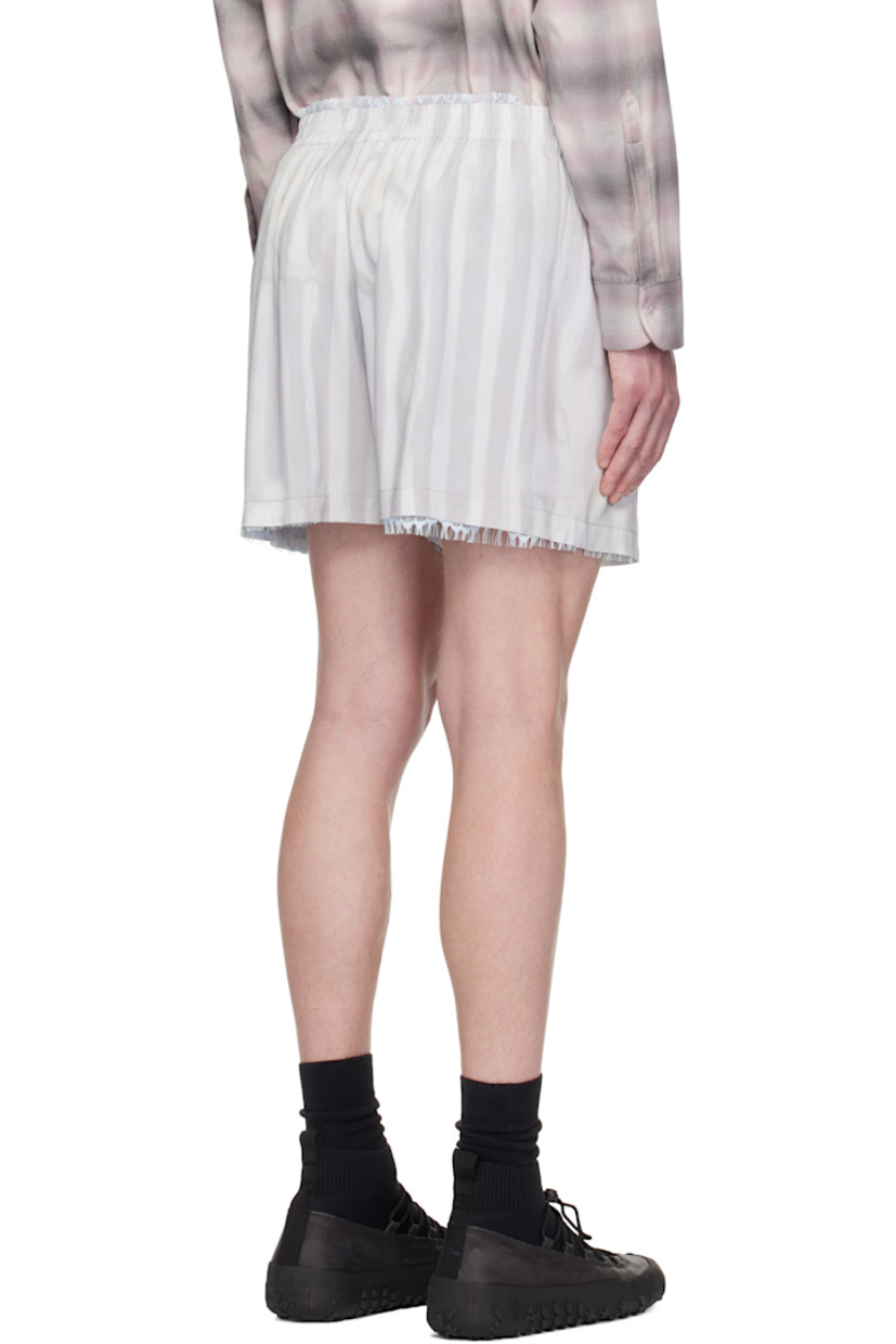 Rose sylk satin shorts. Exposed sheer recycled nylon-blend lace lining.

· Stripes and printed floral graphic throughout
· Logo patch at elasticized waistband
· Mock fly

Supplier color: Washed wavy navy