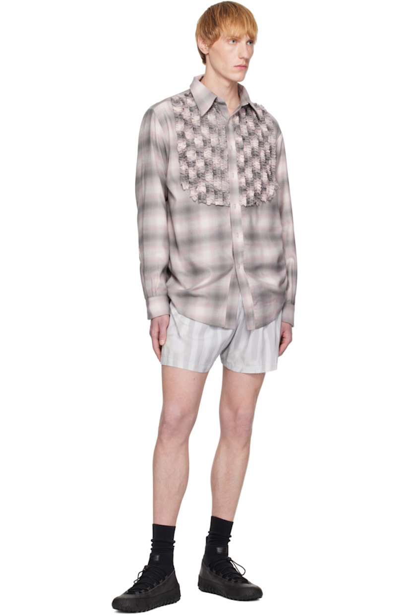 Rose sylk satin shorts. Exposed sheer recycled nylon-blend lace lining.

· Stripes and printed floral graphic throughout
· Logo patch at elasticized waistband
· Mock fly

Supplier color: Washed wavy navy