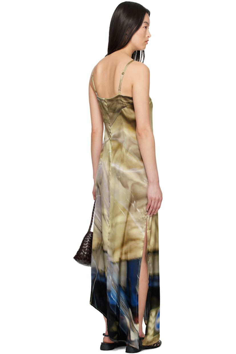 Silk satin maxi dress. Graphic printed throughout.

· Scoop neck
· Darts at chest
· Asymmetric hem
· Slit at side seam
· Adjustable spaghetti straps

Supplier color: Print