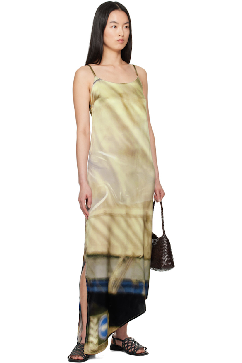 Silk satin maxi dress. Graphic printed throughout.

· Scoop neck
· Darts at chest
· Asymmetric hem
· Slit at side seam
· Adjustable spaghetti straps

Supplier color: Print