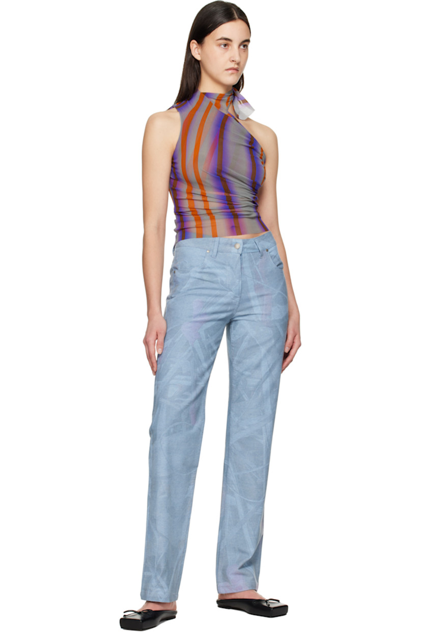 Non-stretch denim jeans. Graphic pattern and fading throughout.

· Belt loops
· Four-pocket styling
· Button-fly
· Leather logo patch at back waistband
· Logo flag at back pocket
· Logo-engraved antiqued silver-tone hardware

Supplier color: Print