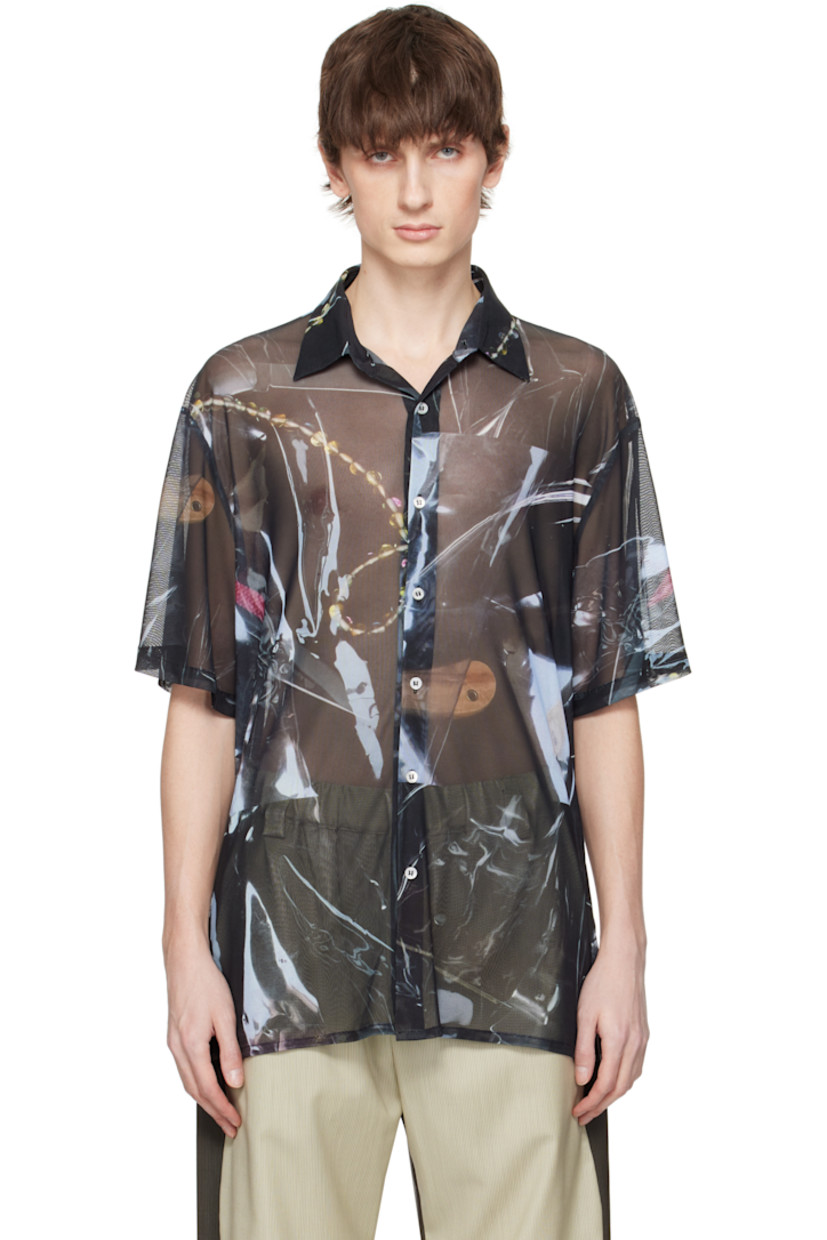 Sheer stretch polyester mesh shirt. Graphic pattern printed throughout.

· Spread collar
· Button closure
· Tennis-tail hem

Supplier color: Print