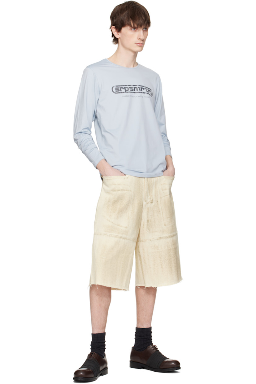 Cotton twill shorts. Smudging throughout.

· Belt loops
· Four-pocket styling
· Zip fly
· Frayed edge at cuffs
· Logo patch at back waistband

Supplier color: Ecru