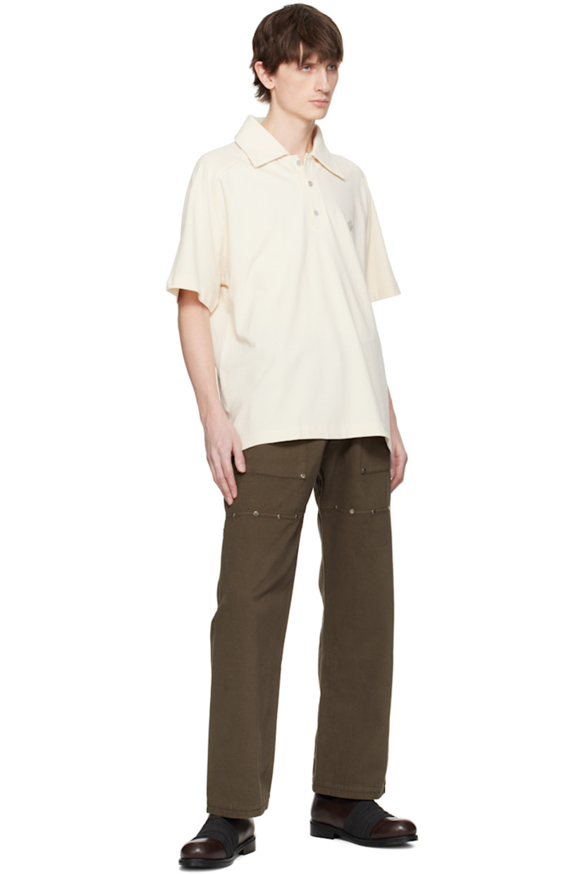 Cotton piqué polo.

· Spread collar
· Three-button placket
· Logo embroidered at chest
· Tennis-tail hem
· Saddle shoulders

Part of the RITES OF CARE collection.

Supplier color: Cream yellow