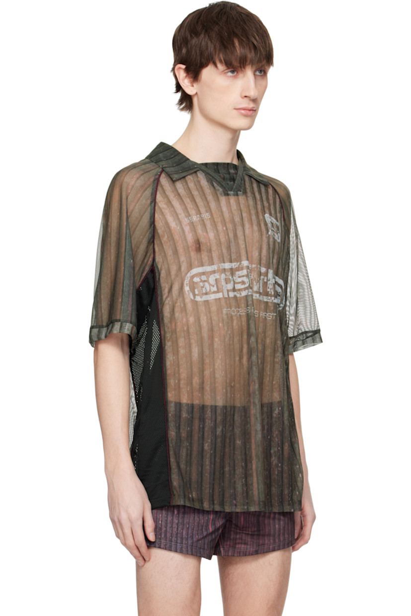 Semi-sheer stretch polyester mesh polo. Piping and stripes throughout.

· Spread collar
· Open placket
· Logos and text printed at front
· Raglan sleeves

Supplier color: Print