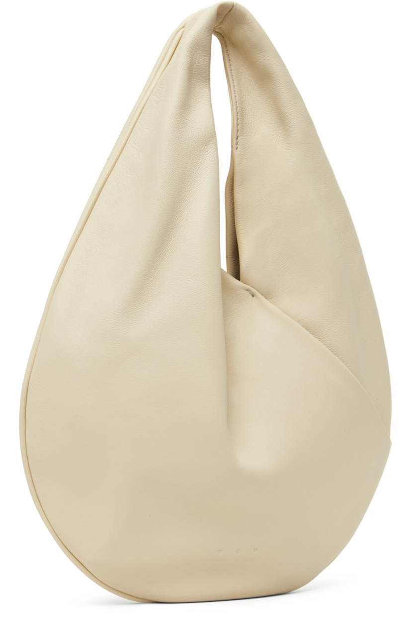 Grained lambskin top handle bag in off-white.

· Carry handle
· Logo embossed at face
· Magnetic closure
· Ottoman lining
· H8" x W9.5" x D1"
· Total height: H13"

Supplier color: Cream