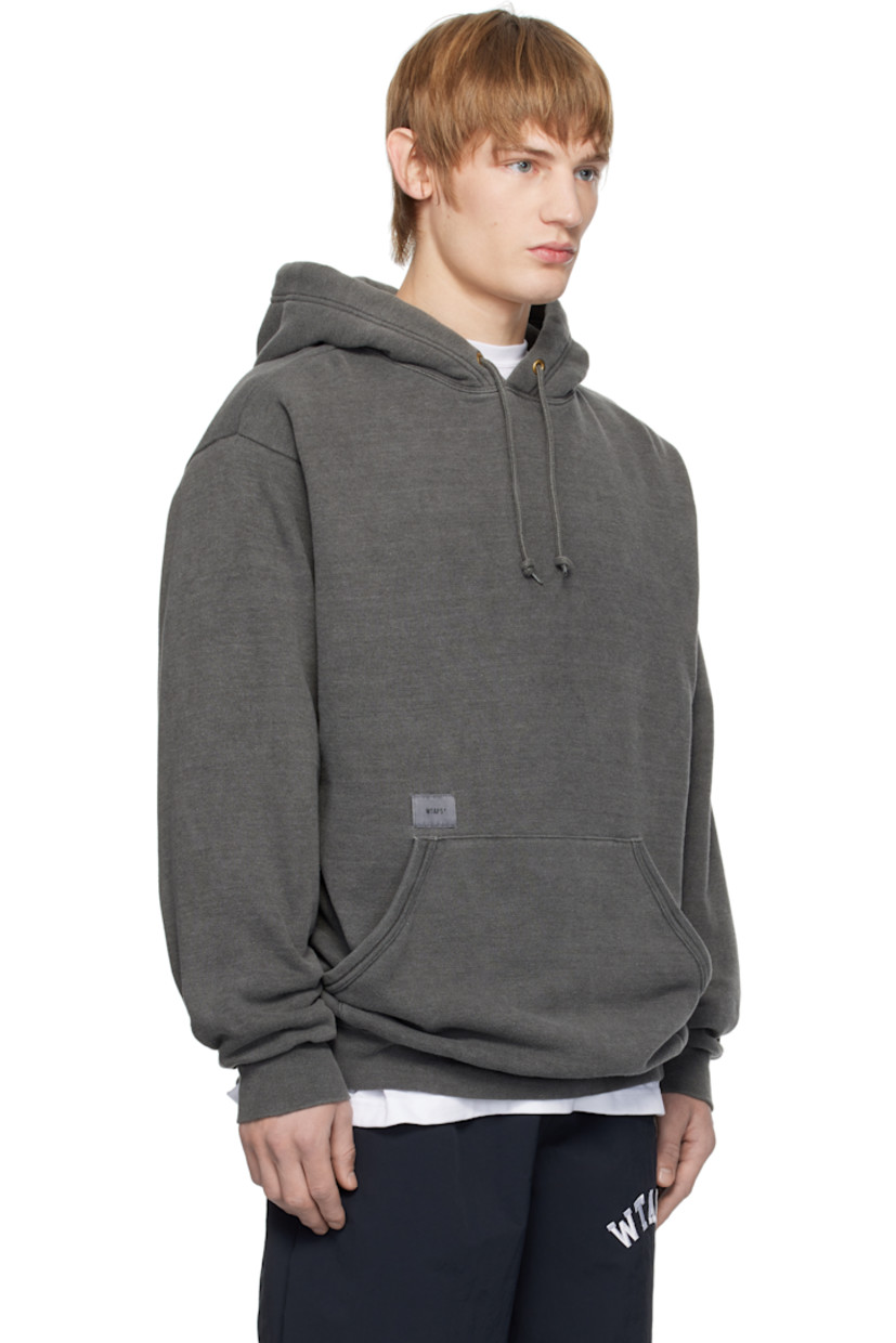 Cotton- and recycled polyester-blend fleece hoodie.

· Drawstring at hood
· Logo patch at front
· Kangaroo pocket
· Logo flag at side seam
· Rib-knit hem and cuffs
· Dropped shoulders 
· Embroidered logo at back

Supplier color: Black