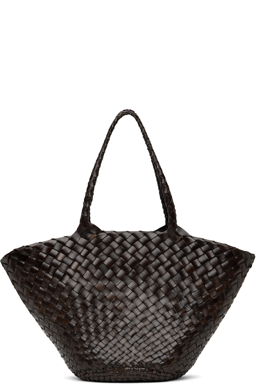 Handcrafted basket-woven buffalo calfskin tote in brown. 

· Twin carry handles
· Open throat
· Logo disc hand-sewn at interior
· Unlined
· H17.5" x W10.5" x D6"
· Total height: H19.5"

Supplier color: Dark brown