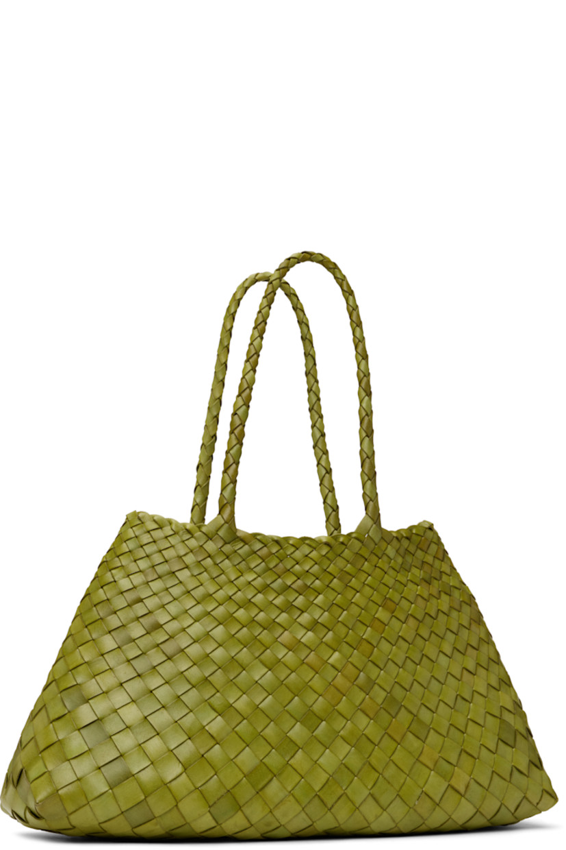 Handcrafted basket-woven buffalo calfskin tote in green.

· Twin carry handles
· Open throat
· Logo disc hand-sewn at interior
· Unlined
· H8.75" x W17.5" x D6"
· Total height: H17.5"

Supplier color: Bamboo green