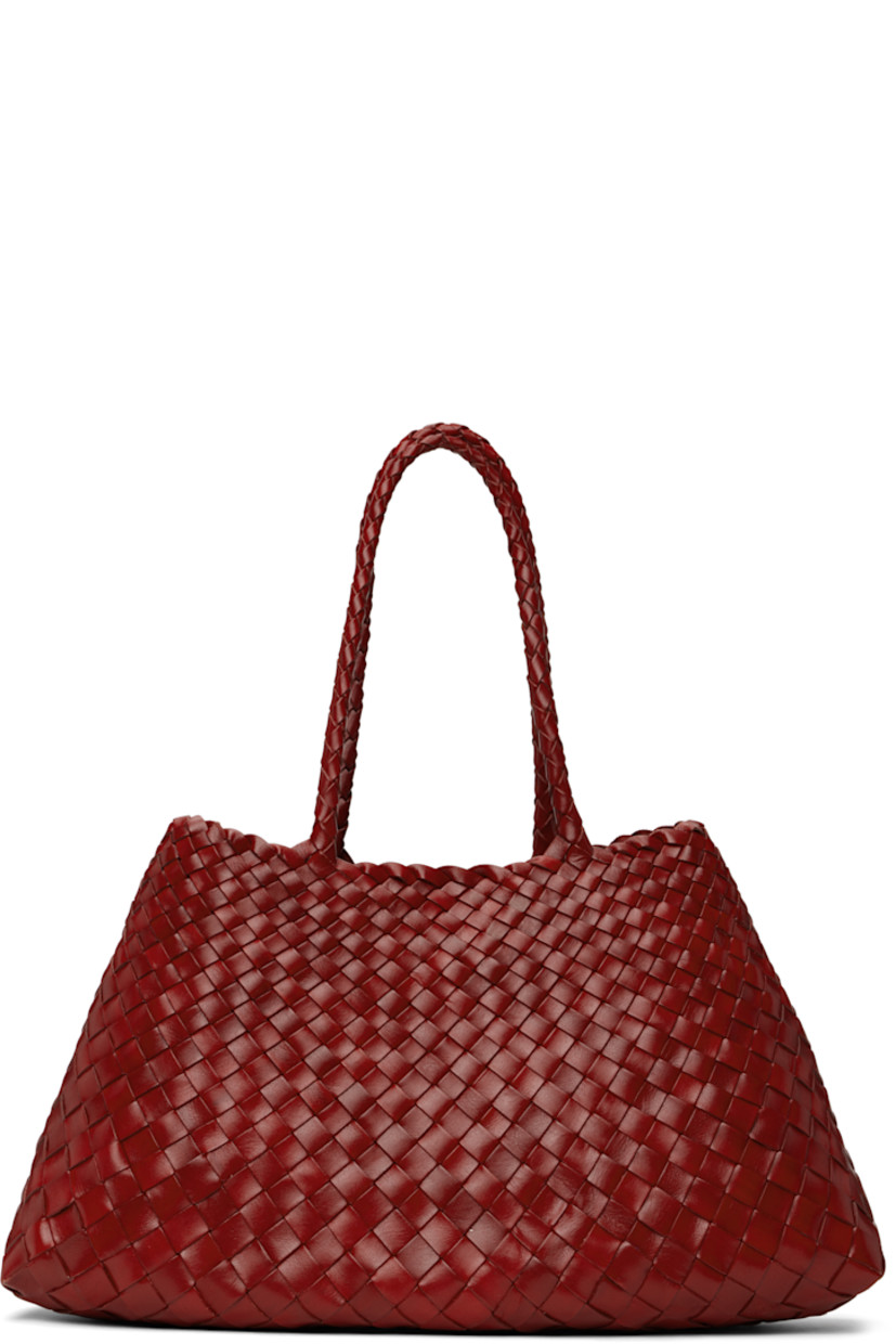 Handcrafted basket-woven buffalo calfskin tote in red.

· Twin carry handles
· Open throat
· Logo disc hand-sewn at interior
· Unlined
· H8.75" x W17.5" x D6"
· Total height: H17.5"

Supplier color: Poppy red
